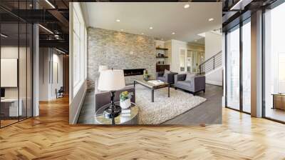 modern great room with a floor to ceiling stone fireplace Wall mural