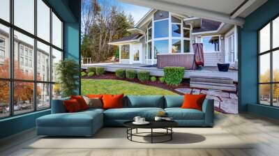 Traditional back deck with tall windows, and jacuzzi tub. Wall mural