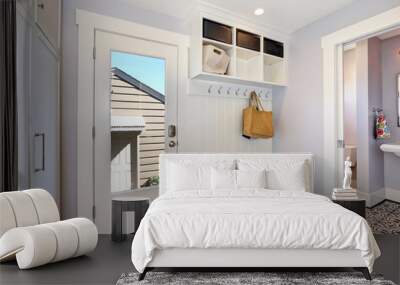 white hallway interior. storage cabinet with hangers Wall mural