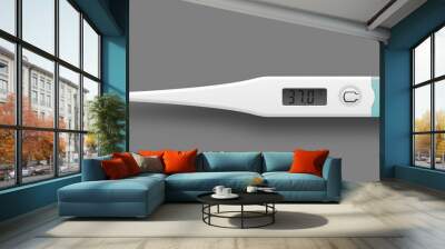 Medical digital thermometer with numbers of 37 degrees. Realistic single object isolated on a gray background. Wall mural