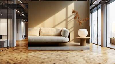 Elegant beige living room with cozy couch, wooden decor in Japandi style, modern interior, concrete wall, sunlight through window in the morning Wall mural