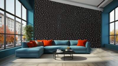 Background with black droplets. An enormous number of water droplets on black surface. Top view Wall mural