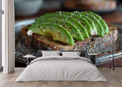 A plate of avocado toast with sesame seeds on top Wall mural