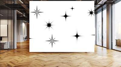 A set of star icons, a collection of illustrations of twinkling stars, sparks, a shining explosion. Wall mural