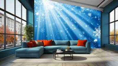 Blue background with white snowflakes and rays of light. Space for text. Winter season, holiday celebration. Wall mural