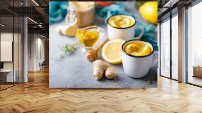 Cups of ginger tea with honey and lemon Wall mural