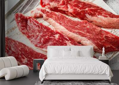 Raw steak with spices on wooden cutting board Wall mural