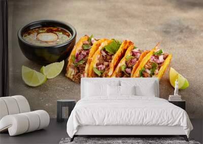 traditional mexican birria consome soup and four taco with stewed beef Wall mural