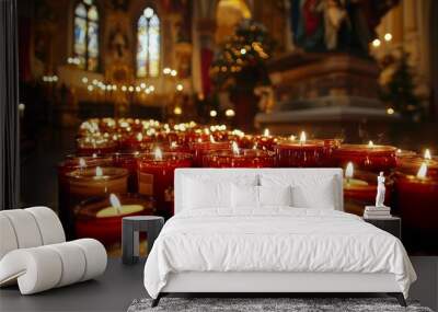 Candles burning in christmas church composition background  Wall mural