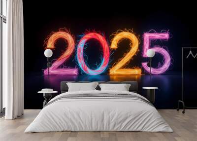 Colorful 2025 year made of light trails illuminated against a dark background for New Year celebration Wall mural