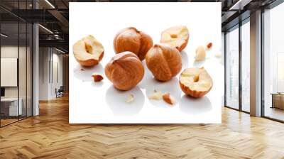 Full and halfs of hazelnuts on white background. Isolated Wall mural