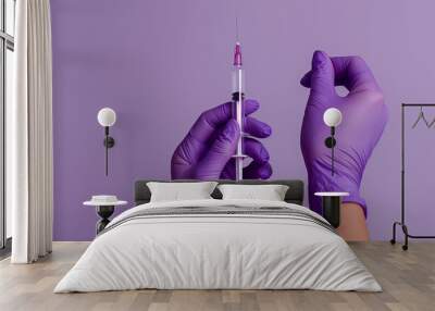 hands in protective purple gloves hold a syringe on a purple background Wall mural