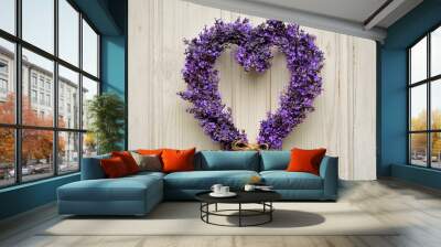 Lavender heart wreath on white wooden door close-up Wall mural