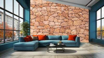 Light brown sandstone wall, stone wall background. Wall mural