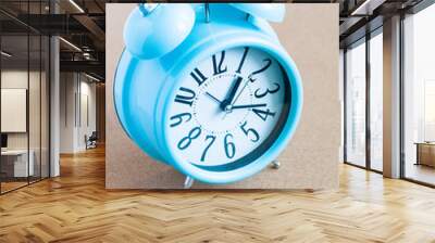 Blue alarm clock on cork Wall mural