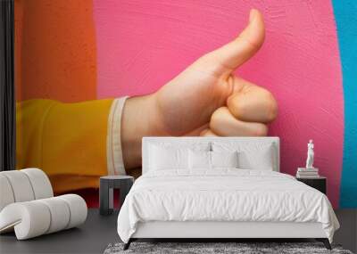 People holding hand with thumb up on colorful wallpaper background
 Wall mural