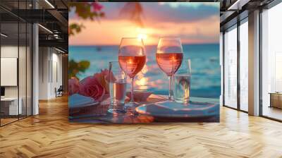 Romantic sunset dinner on the beach. Table honeymoon set for two with luxurious food, glasses of champagne drinks in a restaurant with sea view. Summer love, romance date on vacation concept. Wall mural