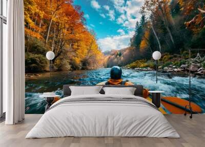 Autumn active leisure. Rafting on a mountain river, scenic view of autumn nature Wall mural