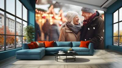 Happy two elderly people woman, man walking against the backdrop of christmas fair lights holding hands on the street, wearing coats. Design ai Wall mural