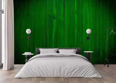 Dark green wood. Natural texture background. Vignette and dark shadow effect. Wall mural