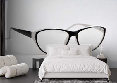 stylish white with black glasses close up on white background. Wall mural