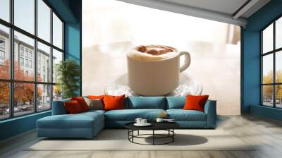 cup of cappuccino on the table. Isolated outdoor Wall mural