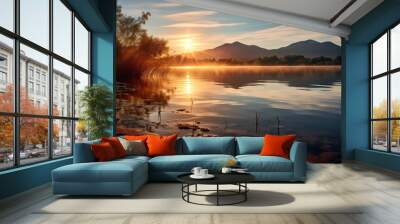 Tranquil sunrise over a calm lake, with reflecting mountains and soft golden light illuminating the serene landscape Wall mural