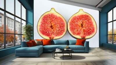 two halves of fig fruit isolated on white background   Wall mural