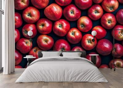 A vibrant display of red apples fills the frame. This image captures their glossy skin and fresh appearance. Perfect for food blogs or healthy eating themes. AI Wall mural