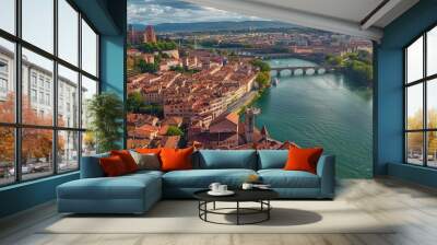 Beautiful aerial view of a historic city along a winding river with old charm. The image showcases classic architectural style and is ideal for travel and tourism purposes. AI Wall mural