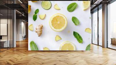 Fresh lemon slices with mint and ginger on white background. Vibrant, refreshing and healthy setup. Perfect for culinary concepts, health drinks, and kitchen decor. AI Wall mural