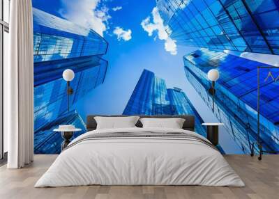 Modern glass skyscrapers in a bustling city. Blue sky and clouds. Perfect for business and architecture themes. Stunning urban landscape. Abstract style. AI Wall mural