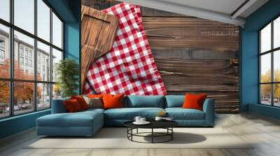 Wooden cutting board on rustic wooden table with red checkered cloth. Perfect for cooking, kitchen design, or food blog background. AI Wall mural