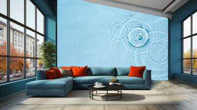 Background with round rings on the water surface, aqua texture Wall mural