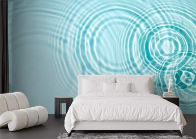 blue water texture, blue mint water surface with rings and ripples. spa concept background. flat lay Wall mural