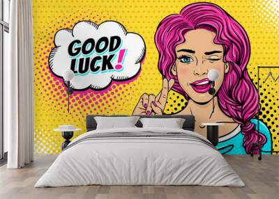 Pop art female face. Sexy young woman winks with pink hair and open smile, crossed fingers for luck symbol and Good Luck speech bubble on halftone. Vector colorful illustration in retro comic style. Wall mural