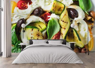 Mediterranean salad with mozzarella, olives, basil and grilled vegetables Wall mural