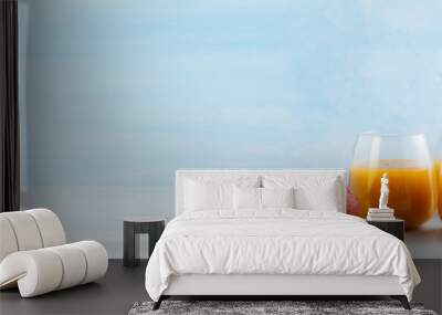 peach juice in glasses and a decanter and fresh peaches with lea Wall mural