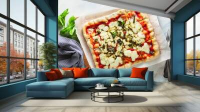 square homemade pizza margarita on a marble table. classical italian cuisine Wall mural