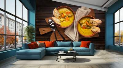 two bowls of the traditional soup on a wooden background Wall mural