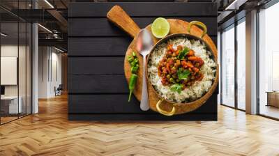 vegan curry with green peas and basmati rice served on a wooden table tray, healthy Indian comfort food Wall mural