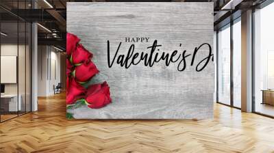 Happy Valentine's Day Calligraphy Logo Design with Beautiful Red Rose Flowers Over Rustic Wood Background Wall mural