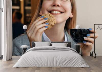 Food to Boost Brain and Memory, brainpower, nutrients for brain function. Girl student studying in cafe with cookies and hot drink Wall mural