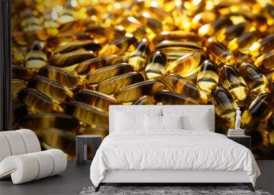 Many yellow Vitamin D, Fish Oil, Omega-3 capsules in sunshine light on table. Soft Fish Oil, Vitamin D supplements capsules on wooden background. Selective focus Wall mural