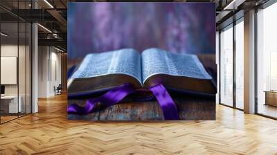 Open bible with purple ribbon bookmark on Ash Wednesday, ash cross visible on the page, feeling of devotion and quiet reflection Wall mural