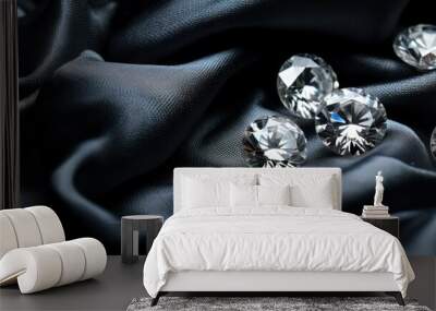 Shiny diamonds brilliants gemstones on navy blue fabric wavy background. Luxury Diamonds crystals and silk satin fabric texture background. Wall mural