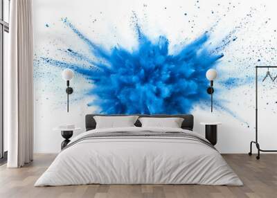 Vivid blue powder explosion against a white background, capturing dynamic movement and energy with scattered particles Wall mural