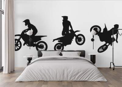 set of silhouettes of motocross racers. isolated on white background. graphic vector illustration. Wall mural