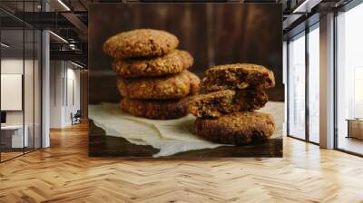 pile of oat cookies on wooden table Wall mural