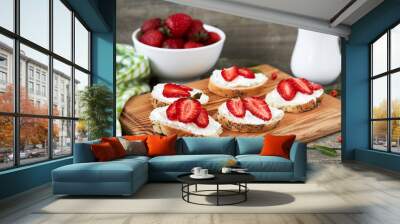 Canape with cottage cheese and strawberry on a cutting  board, horizontal, Wall mural